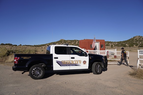A Santa Fe County Sheriff's vehicle enters the Bonanza Creek Ranch in Santa Fe, N.M., Monday, Oct. 25, 2021. Production of the movie that Alec Baldwin was making when he shot and killed a cinemat ...