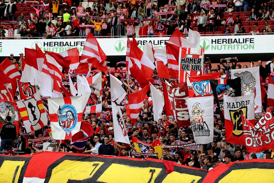 Atletico Madrid s fans cheer during the Women s Iberdola League soccer match between Atletico Madrid and FC Barcelona Barca at the Wanda Metropolitano in Madrid, Spain, 17 March 2019. The event could  ...