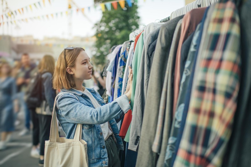 Teenager shopping at a flea market