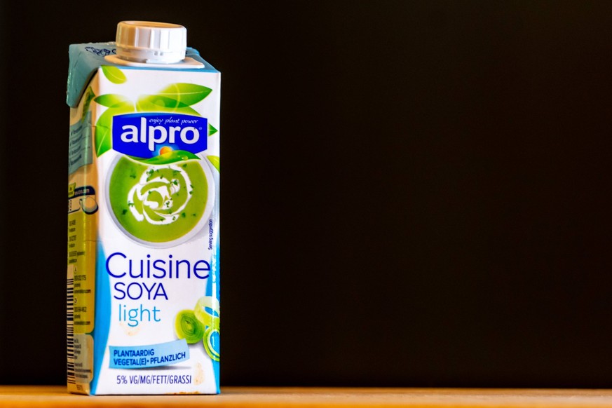 Antwerp, Belgium, September 2020: Illustrative Editorial: Alpro Cuisine Soy light cream. Fully vegan and plant based. Label in Dutch, French and German language, model released, , property released, , ...