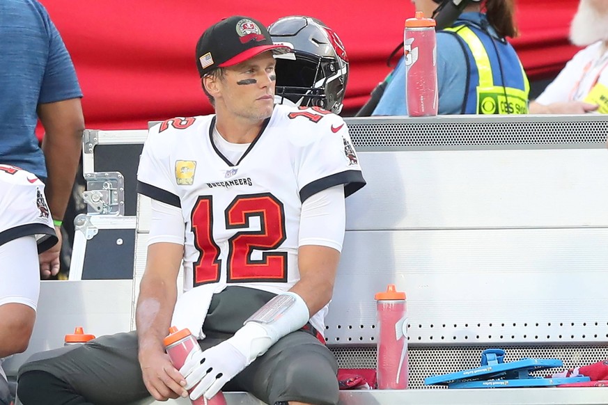 TAMPA, FL - NOVEMBER 06: Tampa Bay Buccaneers Quarterback Tom Brady 12 sits on the bench during the regular season game between the Los Angeles Rams and the Tampa Bay Buccaneers on November 06, 2022 a ...