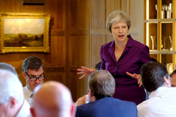 Britain&#039;s Prime Minister Theresa May commences a meeting with her cabinet to discuss the government&#039;s Brexit plans at Chequers, the Prime Minister&#039;s official country residence, near Ayl ...