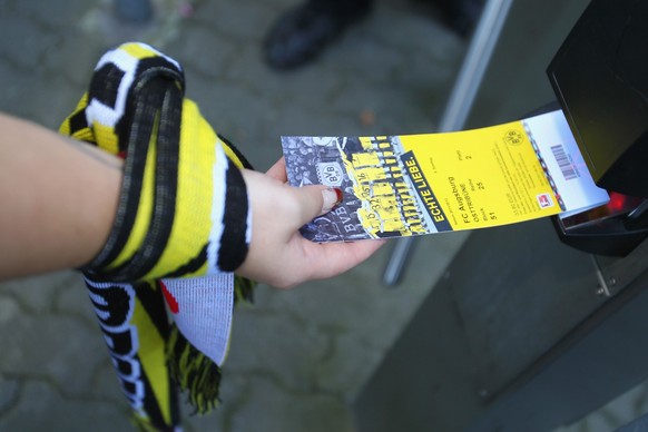 DORTMUND, GERMANY - OCTOBER 01: A ticket is checked prior to the Bundesliga match between Borussia Dortmund and FC Ausgburg at Signal Iduna Park on October 1, 2011 in Dortmund, Germany. (Photo by Chri ...