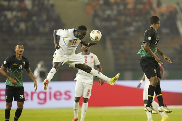 DR Congo&#039;s Silas Katompa Mvumpa jumps for the ball during the African Cup of Nations Group F soccer match between Tanzania and DR Congo at the Amadou Gon Coulibaly Stadium in Korhogo, Ivory Coast ...