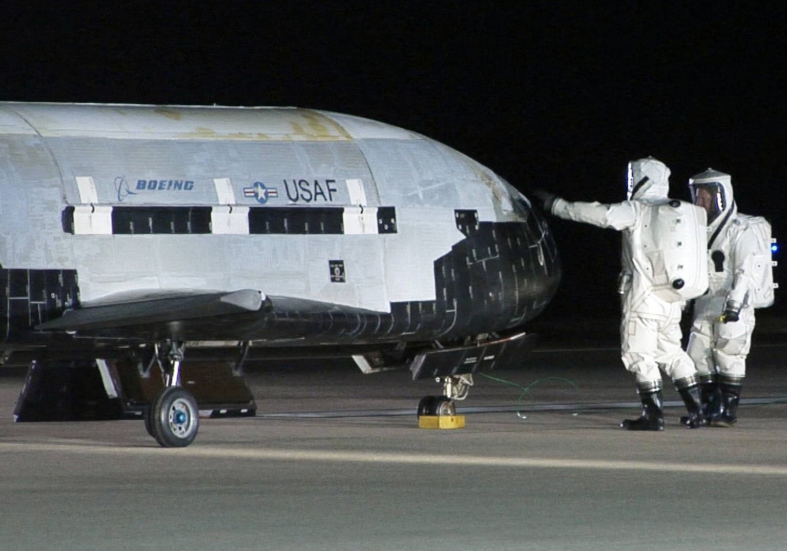 Dec. 11, 2012 - (FILE PHOTO) - The X-37B Orbital Test Vehicle, an experimental robotic space plane, was launched into orbit atop an Atlas V rocket Tuesday. PICTURED: The U.S. Air Force X-37B sits on t ...