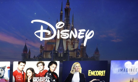 FILE - In this Nov. 13, 2019, photo, a Disney logo forms part of a menu for the Disney Plus movie and entertainment streaming service on a computer screen in Walpole, Mass. Disney reports earnings on  ...