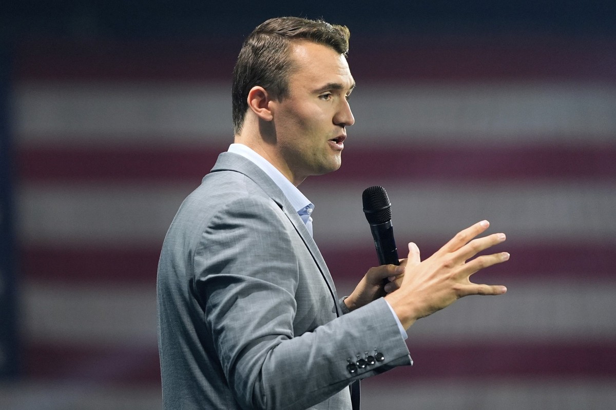 FILE - Turning Point USA Founder Charlie Kirk speaks before Republican presidential candidate former President Donald Trump arrives at the Turning Point Believers' Summit, July 26, 2024, in West ...