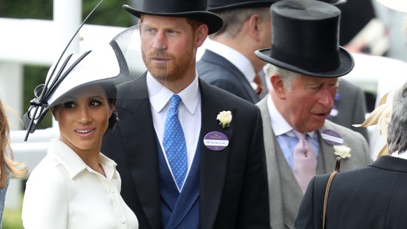 ASCOT, ENGLAND - JUNE 19: Meghan, Duchess of Sussex, Prince Harry, Duke of Sussex and Prince Charles, Prince of Wales attend Royal Ascot Day 1 at Ascot Racecourse on June 19, 2018 in Ascot, United Kin ...