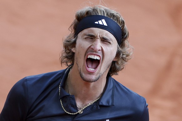 Germany&#039;s Alexander Zverev celebrates winning his quarterfinal match of the French Open tennis tournament against Argentina&#039;s Tomas Martin Etcheverry in four sets, 6-4, 3-6, 6-3, 6-4, at the ...