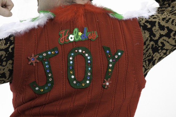 Super tacky handmade christmas sweater - Sporting the sweater flexing muscles