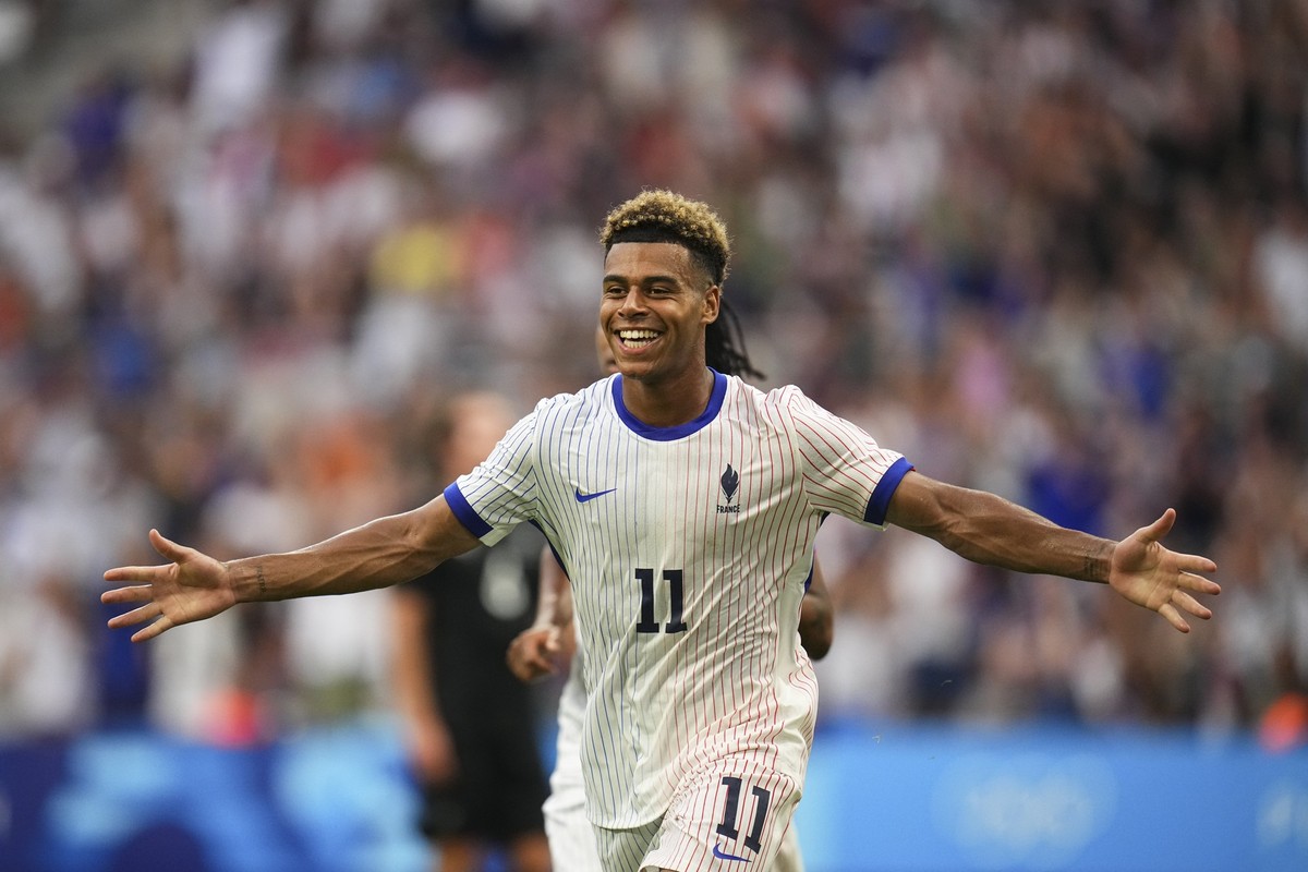France's Desire Doue celebrates after scoring his side's second goal during the men's Group A soccer match between New Zealand and France at the Velodrome Stadium, during the 2024 Summe ...