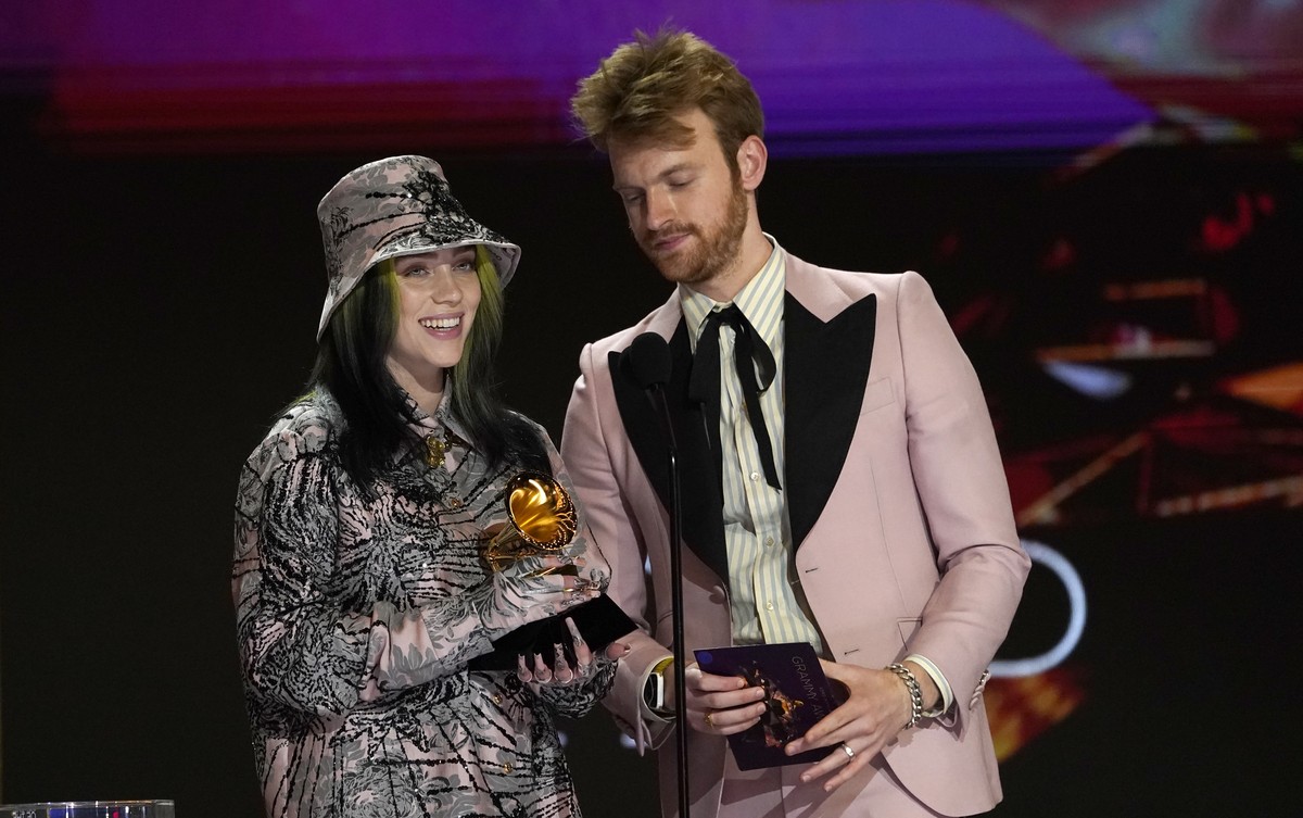 Billie Eilish, left, and Finneas accept the award for record of the year for "Everything I Wanted" at the 63rd annual Grammy Awards at the Los Angeles Convention Center on Sunday, March 14, ...