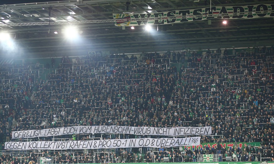 Sport Bilder des Tages SOCCER - BL, Rapid vs Mattersburg VIENNA,AUSTRIA,01.MAR.20 - SOCCER - tipico Bundesliga, SK Rapid Wien vs SV Mattersburg. Image shows fans with a banner. Keywords: Wien Energie. ...