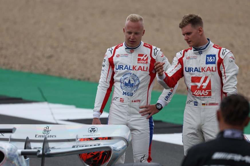 Formula 1 2021: British GP SILVERSTONE CIRCUIT, UNITED KINGDOM - JULY 15: Nikita Mazepin, Haas F1 and Mick Schumacher, Haas F1 at the 2022 Car Launch during the British GP at Silverstone Circuit on Th ...