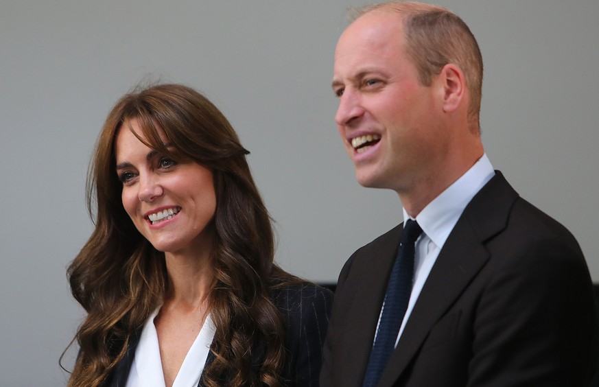 CARDIFF, WALES - OCTOBER 03: Prince William, Prince of Wales and Catherine, Princess of Wales meet with members from the Windrush Cymru Elders during a visit to the Grange Pavilion as they celebrates  ...