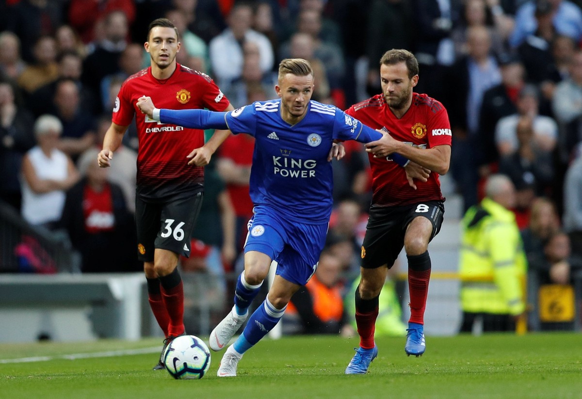 Soccer Football - Premier League - Manchester United v Leicester City - Old Trafford, Manchester, Britain - August 10, 2018 Leicester City's James Maddison in action with Manchester United's ...