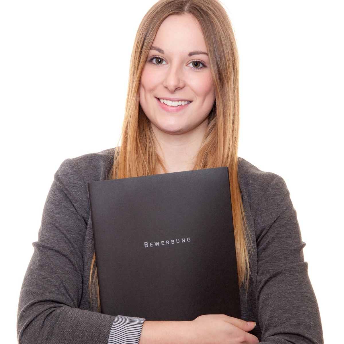 Young woman holding her german application file. All on white background.
