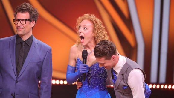 COLOGNE, GERMANY - MARCH 24: Host Daniel Hartwich and contestants Anna Ermakova and Valentin Lusin react on stage during the fifth &quot;Let&#039;s Dance&quot; show at MMC Studios on March 24, 2023 in ...