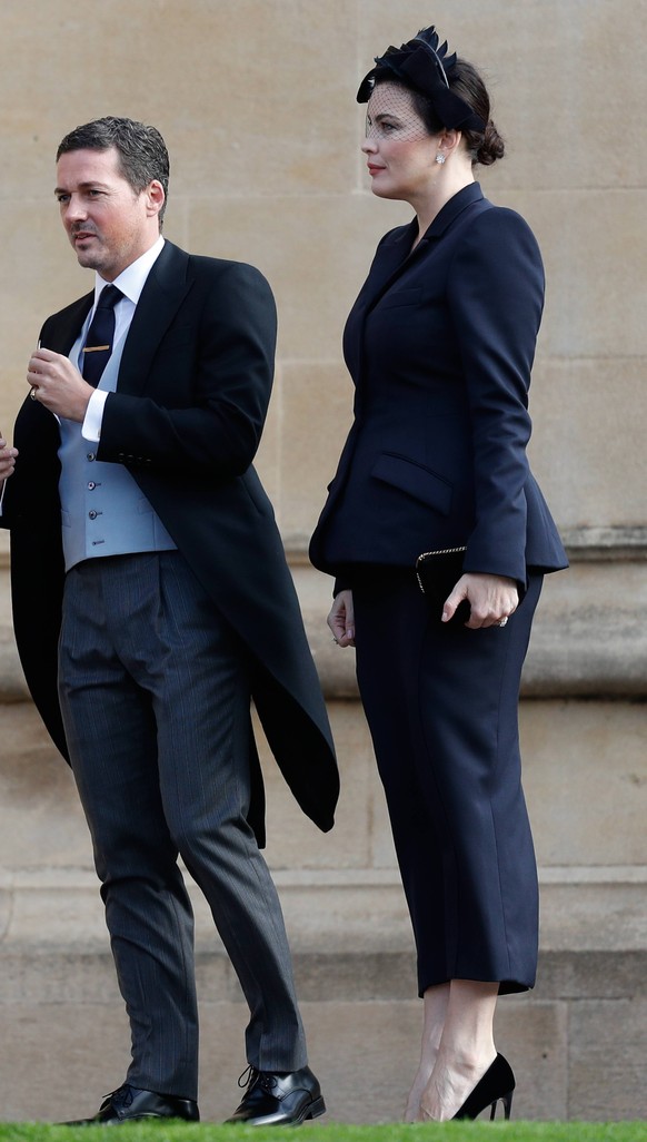 US actress Liv Tyler (R) arrives to attend the wedding of Britain s Princess Eugenie of York to Jack Brooksbank at St George s Chapel, Windsor Castle, in Windsor, on October 12, 2018. (Photo by Adrian ...