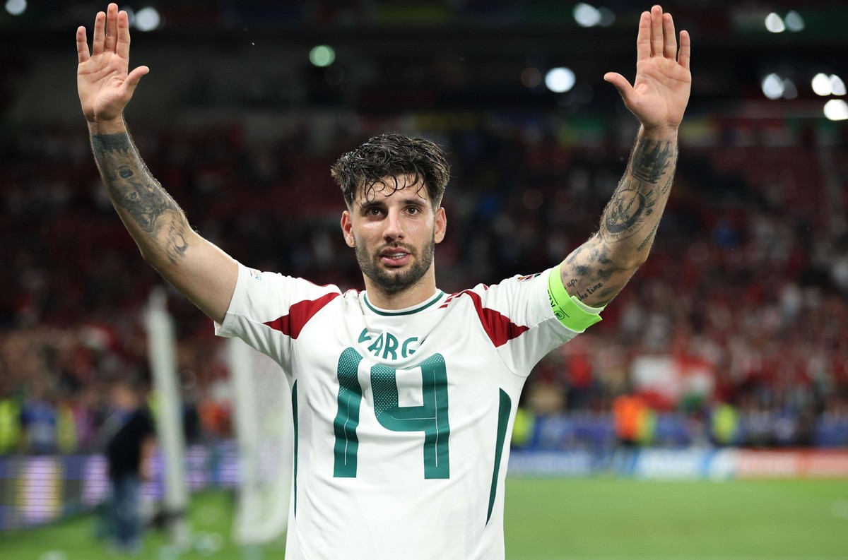 Dominik Szoboszlai of Hungary with Barnabas Varga of Hungary s shirt on after the full time whistle Scotland v Hungary, UEFA European Championship, EM, Europameisterschaft 2024, Group A, Football, Stu ...