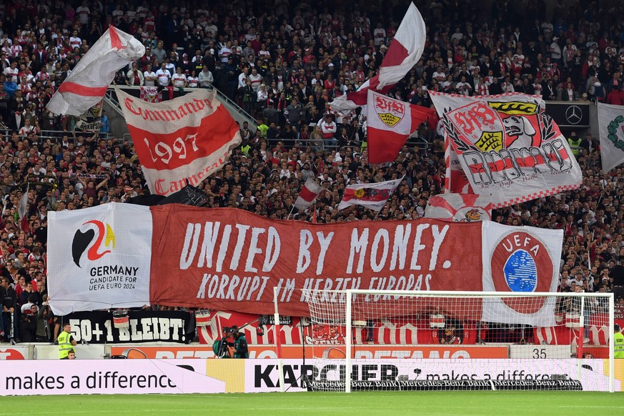 UNITED BY MONEY! KORRUPT IM HERZEN EUROPAS. Stuttgarter Fans,Fussballfans, Ultras demonstrieren mit einem Banner,Transparent gegen den DFB und die Bewerbung um die UEFA EURO EM Europameisterschaft Fus ...