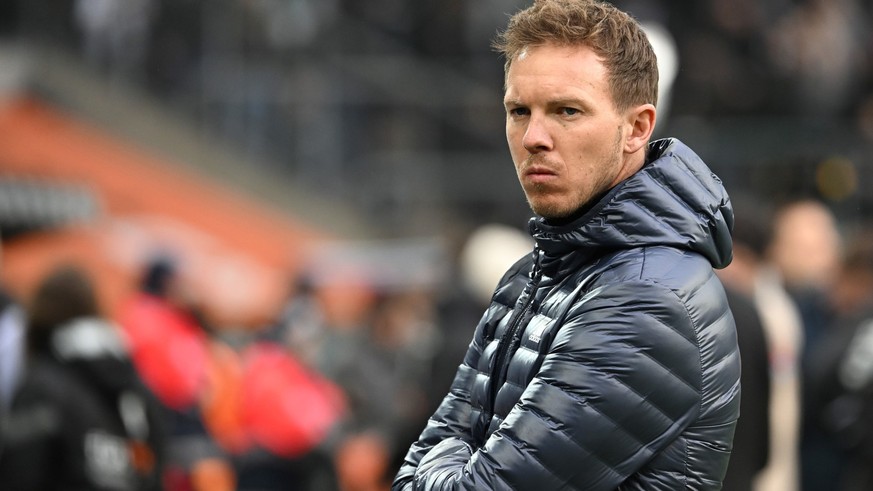 ARCHIV - 18.02.2023, Nordrhein-Westfalen, Mönchengladbach: Fußball: Bundesliga, Borussia Mönchengladbach - Bayern München, 21. Spieltag, Stadion im Borussia-Park: Bayerns Trainer Julian Nagelsmann ste ...