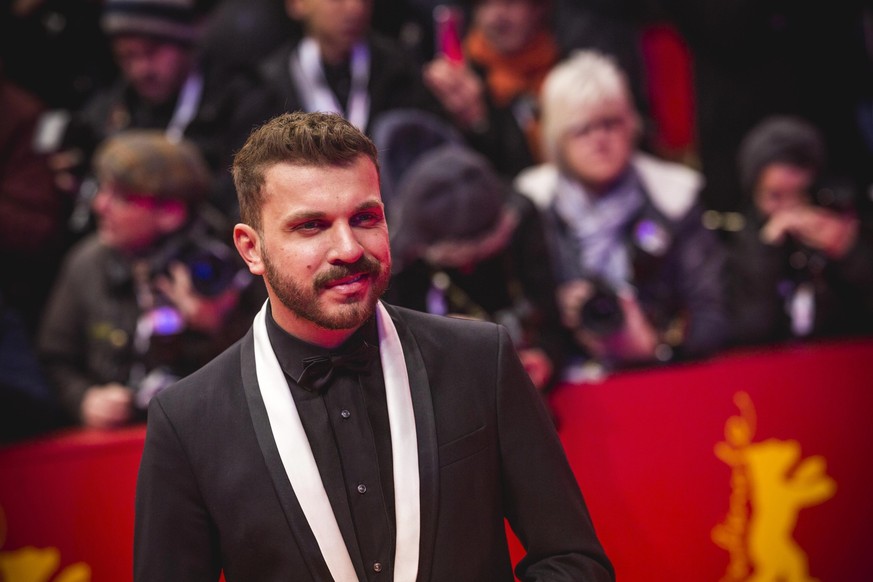 BERLIN, GERMANY - FEBRUARY 20: Edin Hasanovic arrives for the opening ceremony and &quot;My Salinger Year&quot; premiere during the 70th Berlinale International Film Festival Berlin at Berlinale Palac ...