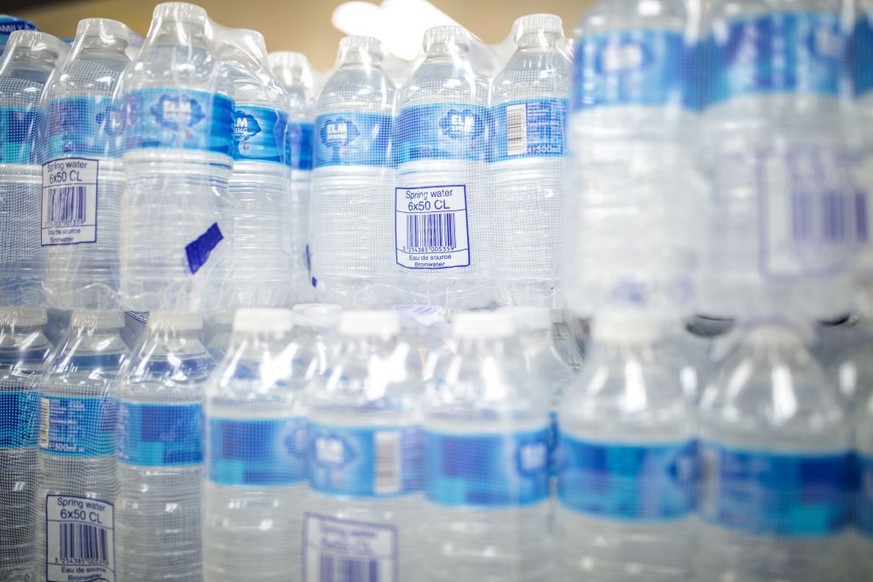 LONDON, ENGLAND - NOVEMBER 20: Plastic water bottles on display in a supermarket on November 20, 2017 in London, England. The Chancellor Philip Hammond is expected to announce a consultation into a po ...