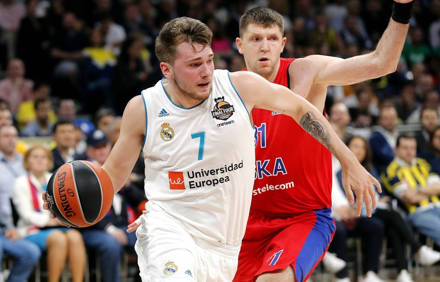 (180519) -- BELGRADE, May 19, 2018 -- Real Madrid s Luka Doncic (L) vies with CSKA Moscow s Victor Khryapa during Euroleague Final 4 semi final basketball match between CSKA Moscow and Real Madrid in  ...