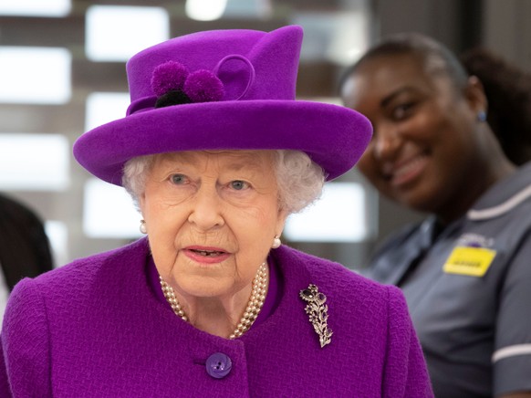 Britain's Queen Elizabeth visits the new premises of the Royal National ENT and Eastman Dental Hospitals in London, Britain February 19, 2020. Heathcliff O'Malley/Pool via REUTERS