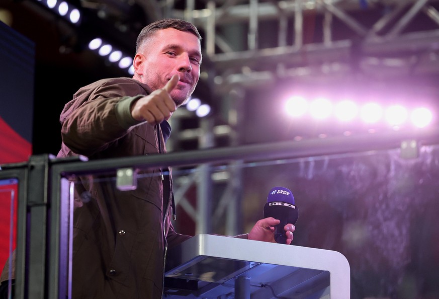 COLOGNE, GERMANY - OCTOBER 07: Former German national player Lukas Podolski seen on the TV platform prior to the international friendly match between Germany and Turkey at RheinEnergieStadion on Octob ...