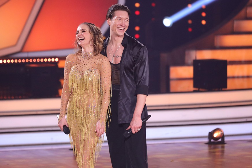 COLOGNE, GERMANY - MARCH 11: Nina Bezzubova-Vinokurov and Evgeny Vinokurov perform on stage during the 3rd show of the 15th season of the television competition show &quot;Let&#039;s Dance&quot; at MM ...