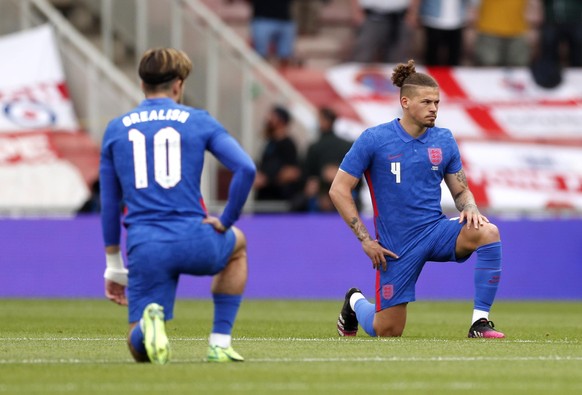 England file photo. File photo dated 06-06-2021 of England's Jack Grealish and Kalvin Phillips take a knee before the international friendly match at Riverside Stadium, Middlesbrough. Issue date: Mond ...