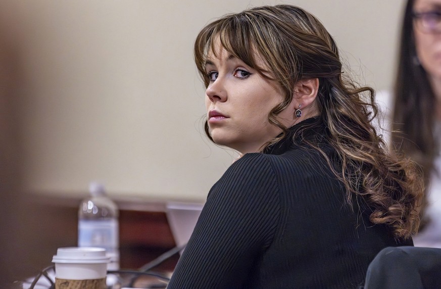 FILE - Hannah Gutierrez-Reed, the former armorer at the movie &quot;Rust,&quot; listens to closing arguments in her trial at district court, Wednesday, March 6, 2024, in Santa Fe, N.M. Gutierrez-Reed  ...