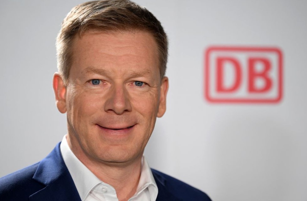 Richard Lutz, CEO of German railway operator Deutsche Bahn (DB), poses during a photo session in front of the DB logo before giving interviews after a press conference on the groups&#039;s results for ...