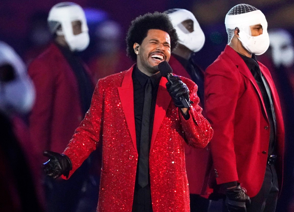 FILE - The Weeknd performs during the halftime show of the NFL Super Bowl 55 football game between the Kansas City Chiefs and Tampa Bay Buccaneers, on Feb. 7, 2021, in Tampa, Fla. (AP Photo/Ashley Lan ...