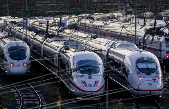 FILE - ICE trains are parked near the central train station in Frankfurt, Germany, Monday, March 27, 2023. A German union is calling for railway workers to stage an eight-hour strike on Friday to back ...