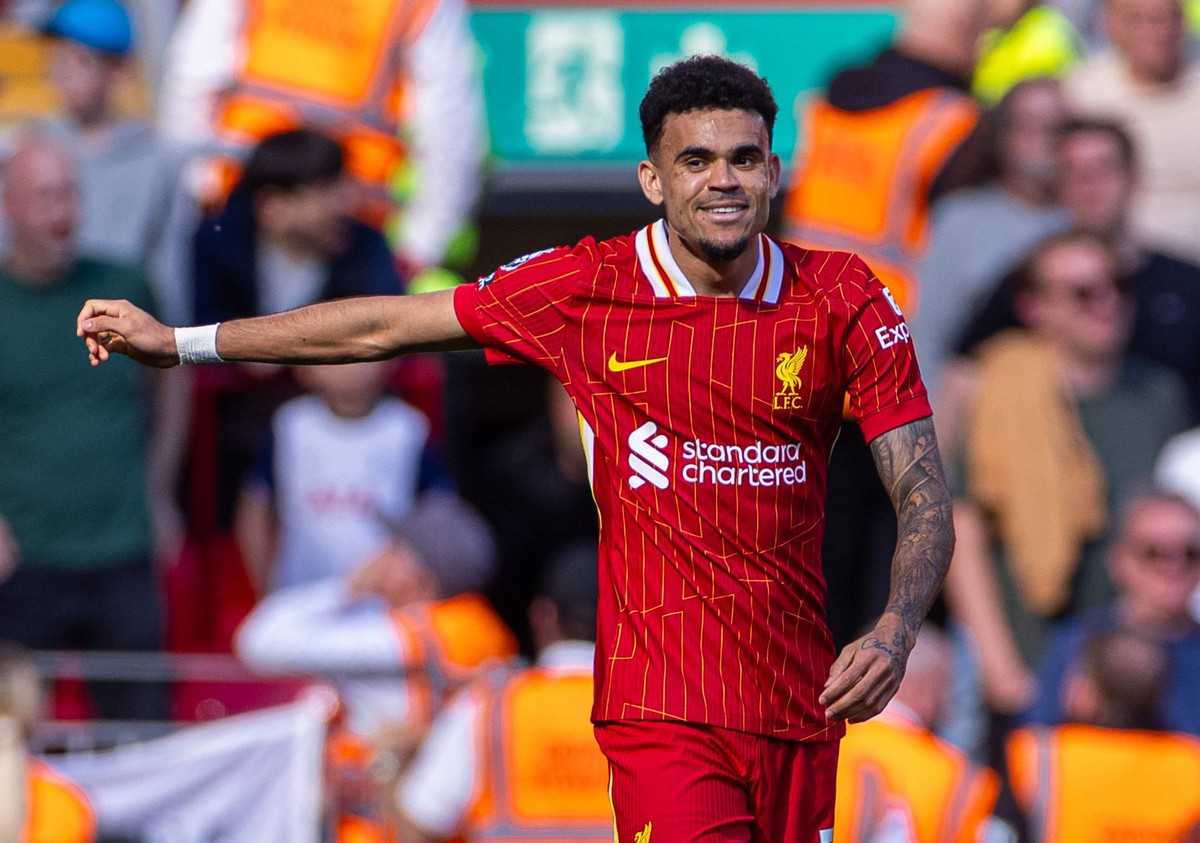 Football - FA Premier League - Liverpool FC v Tottenham Hotspur FC LIVERPOOL, ENGLAND - Sunday, April 27, 2025: Liverpool s Luis Diaz celebrates after scoring his first goal, to level the score at 1-1 ...