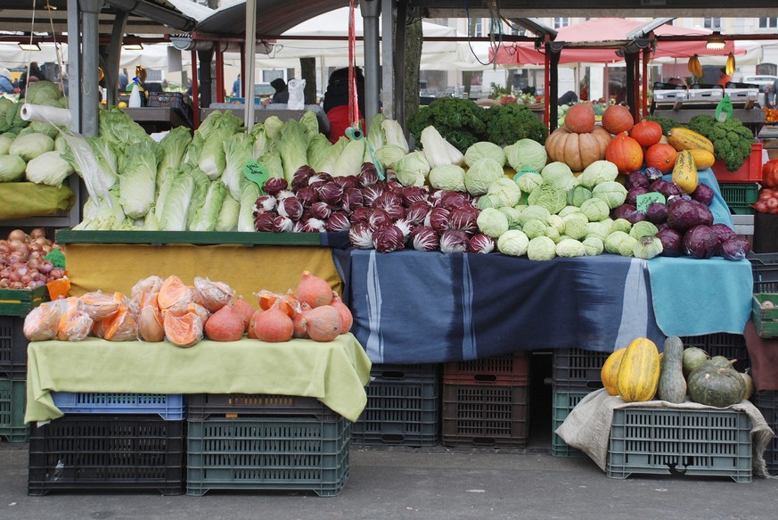 Fresh fruit and vegetables are displayed on a stall on a cold December day at Ljubljana&#039;s Central fruit and vegetable market.