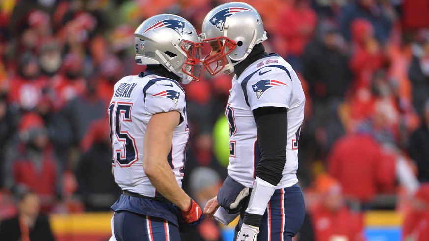 Jan 20, 2019; Kansas City, MO, USA; New England Patriots quarterback Tom Brady (12) and New England Patriots wide receiver Chris Hogan (15) talk prior to their AFC Championship game against the Kansas ...