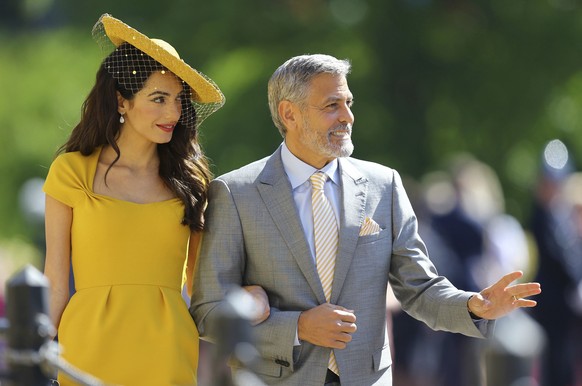 Amal Clooney and George Clooney arrive for the wedding ceremony of Prince Harry and Meghan Markle at St. George&#039;s Chapel in Windsor Castle in Windsor, near London, England, Saturday, May 19, 2018 ...