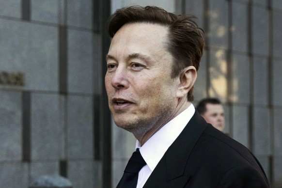 FILE - Elon Musk departs the Phillip Burton Federal Building and United States Court House in San Francisco, Jan. 24, 2023. The government of the U.S. Virgin Islands told a federal judge Monday, May 1 ...