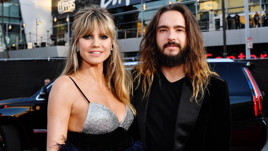 LOS ANGELES, CALIFORNIA - NOVEMBER 24: (L-R) Heidi Klum and Tom Kaulitz attend the 2019 American Music Awards at Microsoft Theater on November 24, 2019 in Los Angeles, California. (Photo by Emma McInt ...