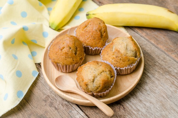Banana muffins cake on wooden background