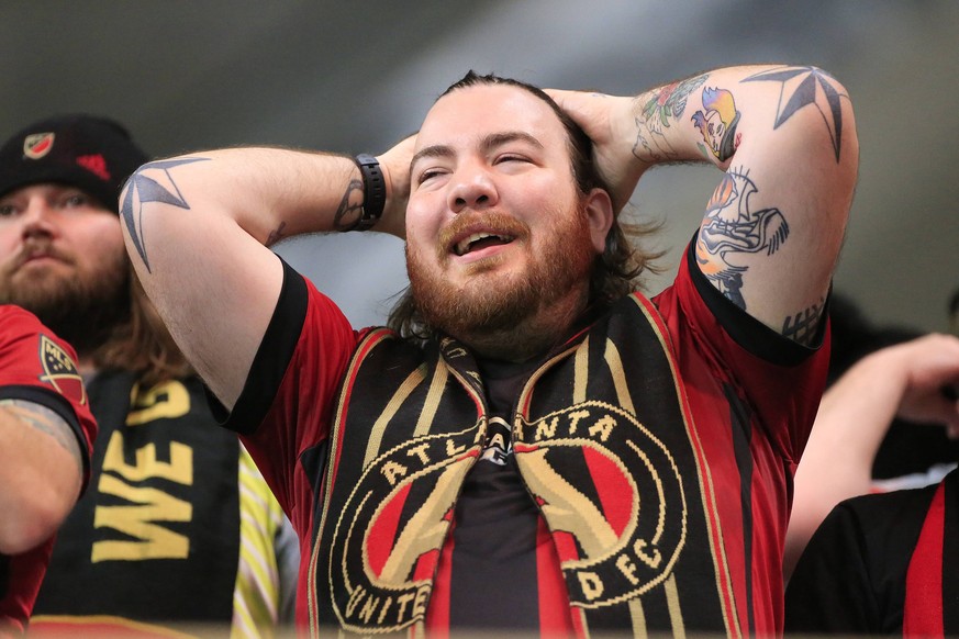 ATLANTA, GA - DECEMBER 08: Atlanta United FC fans celebrate after winning the MLS Fussball Herren USA Cup over the Portland Timbers on December 8, 2018 at the Mercedes-Benz Stadium in Atlanta, GA. (Ph ...