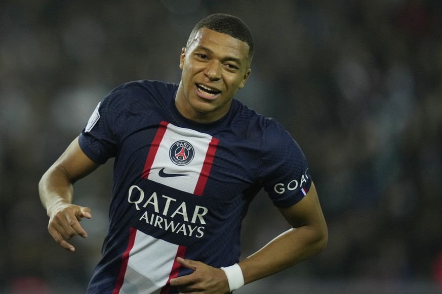 PSG's Kylian Mbappe reacts during the French League One soccer match between Paris Saint-Germain and Marseille at the Parc des Princes in Paris, Sunday, Oct. 16, 2022. (AP Photo/Thibault Camus)