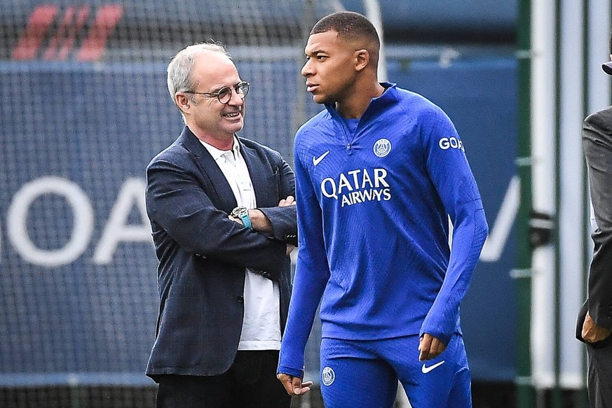 September 5, 2022, Saint-Germain-en-Laye, France, France: Kylian MBAPPE of PSG and Luis CAMPOS of PSG during a Paris Saint-Germain training session at Ooredoo Center on September 05, 2022 in Saint-Ger ...