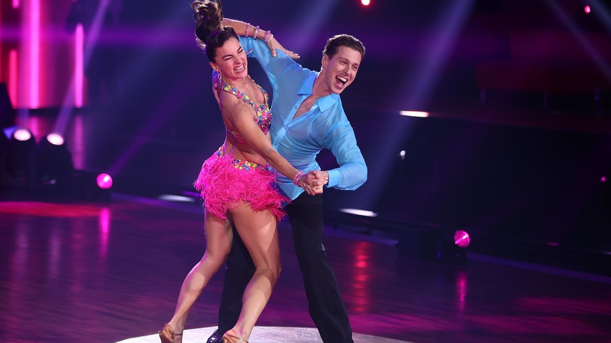 COLOGNE, GERMANY - MARCH 19: Renata Lusin and Valentin Lusin perform on stage during the 3rd show of the 14th season of the television competition &quot;Let&#039;s Dance&quot; on March 19, 2021 in Col ...