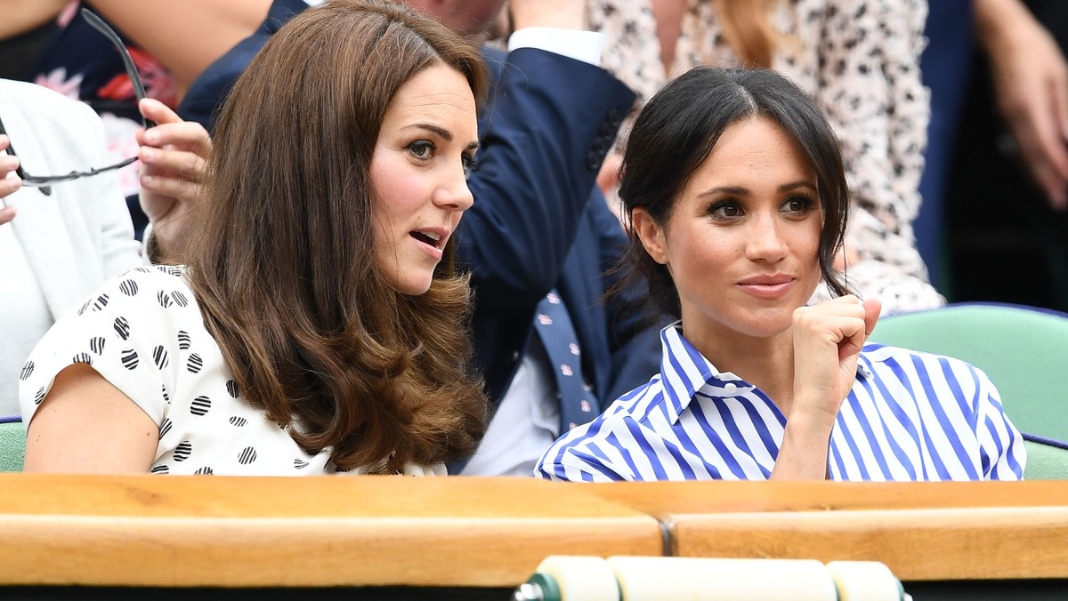 LONDON, ENGLAND - JULY 14: Catherine, Duchess of Cambridge and Meghan, Duchess of Sussex attend day twelve of the Wimbledon Lawn Tennis Championships at All England Lawn Tennis and Croquet Club on Jul ...