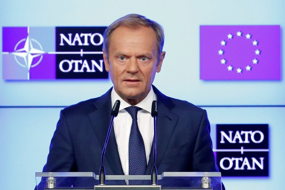 European Council President Donald Tusk speaks next to NATO Secretary General Jens Stoltenberg and European Commission President Jean-Claude Juncker (not pictured), after signing a new joint declaratio ...